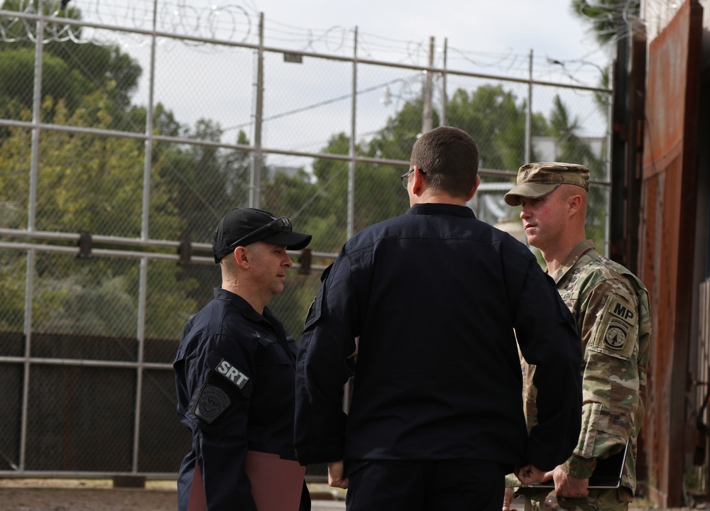 65th MP Company leaders perform a walk through with U.S Customs and Border Protection in Nogales