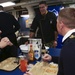 Royal Navy sailors and American Sailors have Thanksgiving on Lincoln