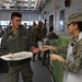 104th Fighter Wing officers and senior enlisted serve lunch