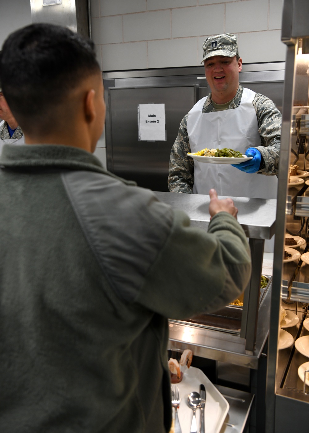 104th Fighter Wing officers and senior enlisted serve lunch