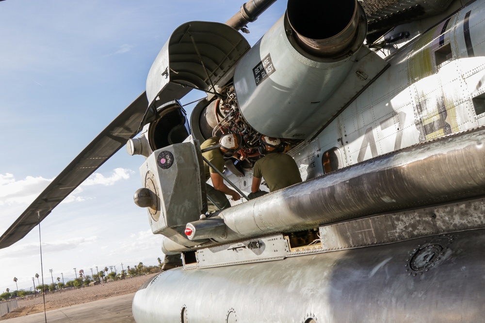 U.S. Marines Conduct Maintenance on a CH-53E
