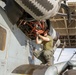 U.S. Marines Conduct Maintenance on a CH-53E