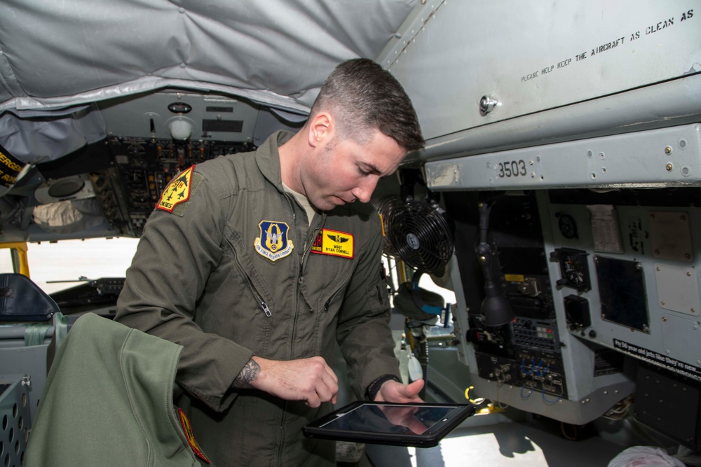 Maintenance and operations ready a KC-135 Stratotanker for flight