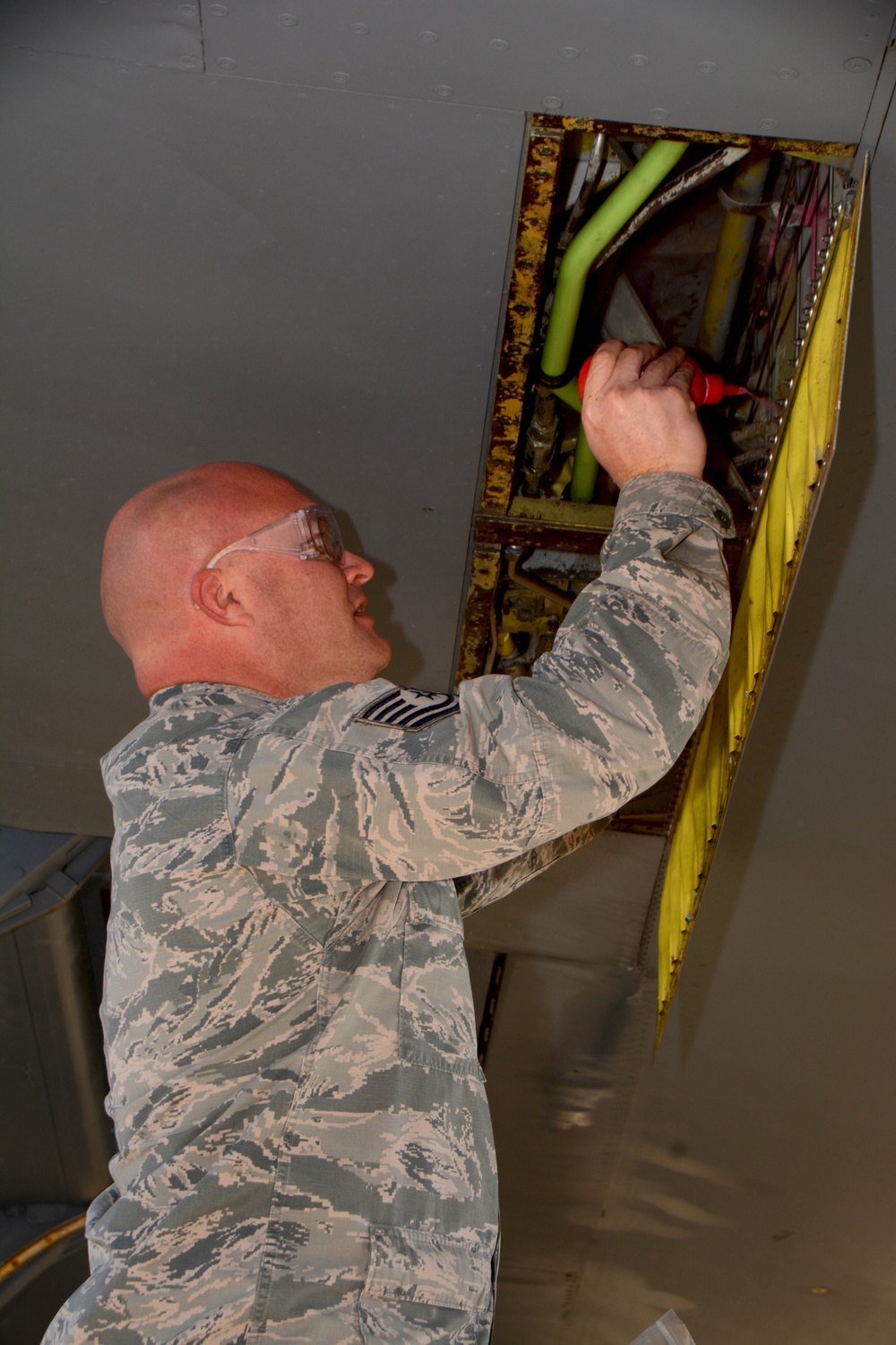 Maintenance and operations ready a KC-135 Stratotanker for flight