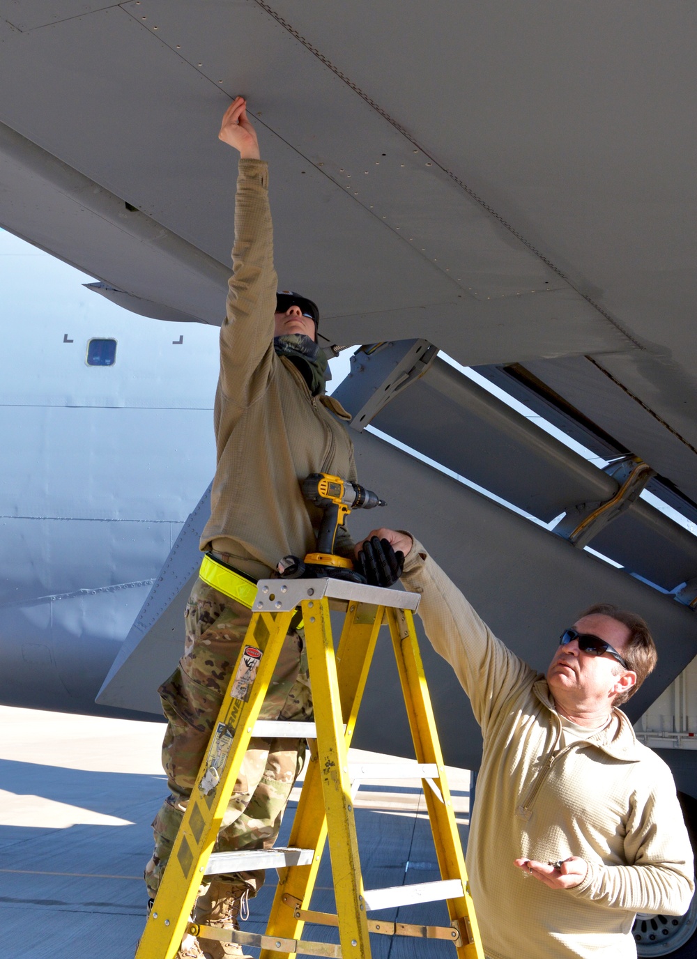 Maintenance and operations ready a KC-135 Stratotanker for flight