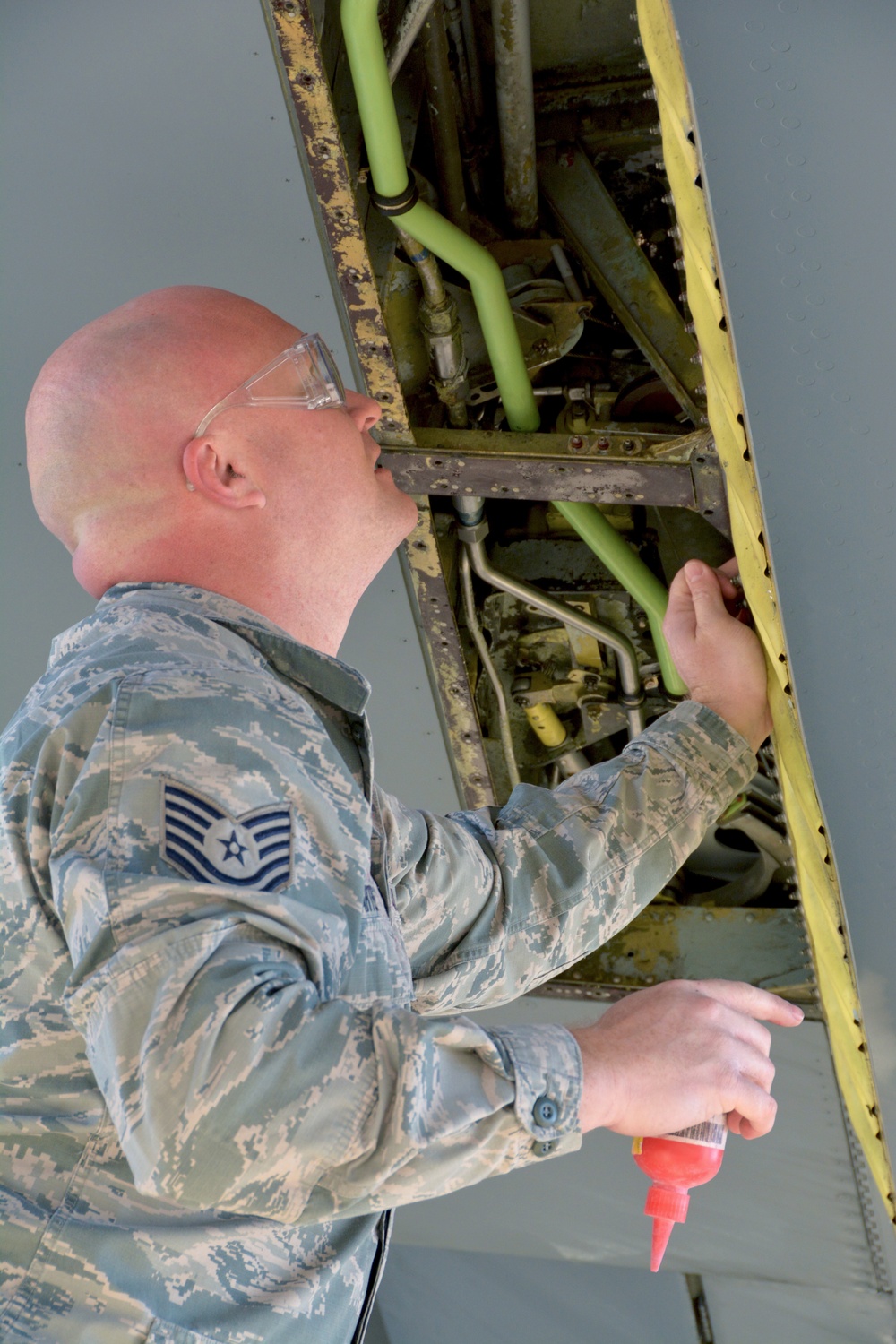 Maintenance and operations ready a KC-135 Stratotanker for flight