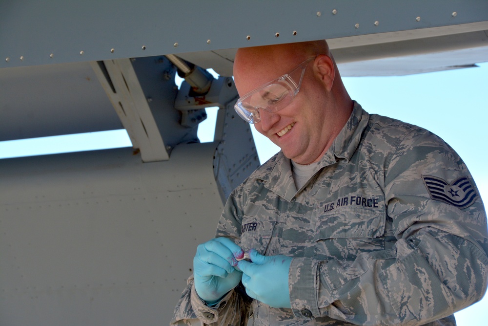 Maintenance and operations ready a KC-135 Stratotanker for flight