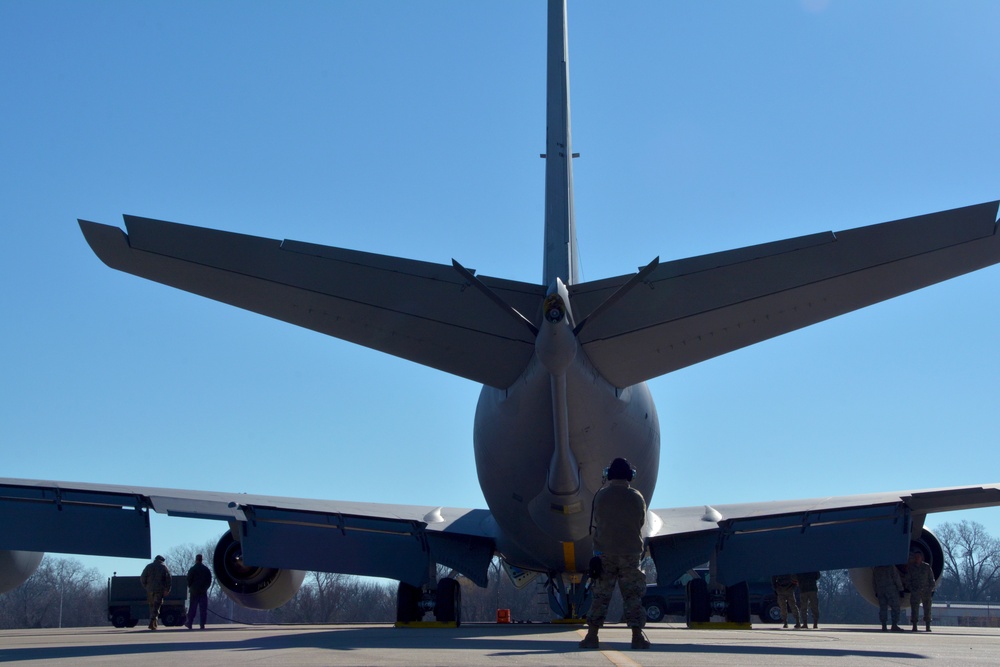 Maintenance and operations ready a KC-135 Stratotanker for flight