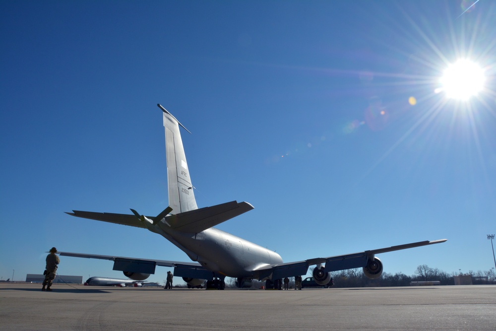 Maintenance and operations ready a KC-135 Stratotanker for flight