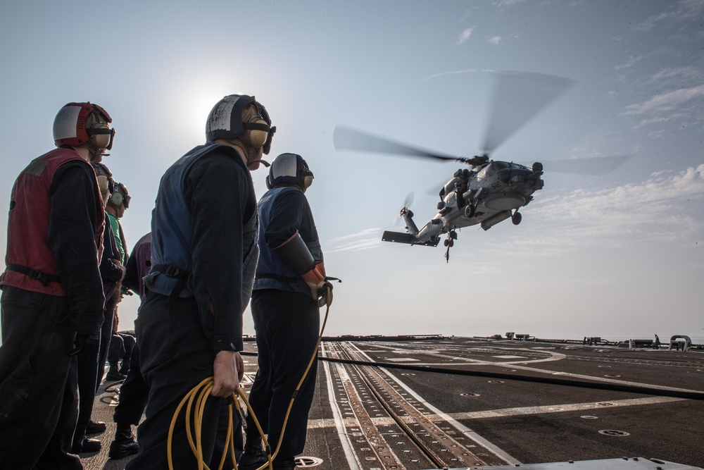 USS Jason Dunham helicopter in-flight refueling and vertical replenishment