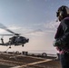 USS Jason Dunham helicopter in-flight refueling and vertical replenishment