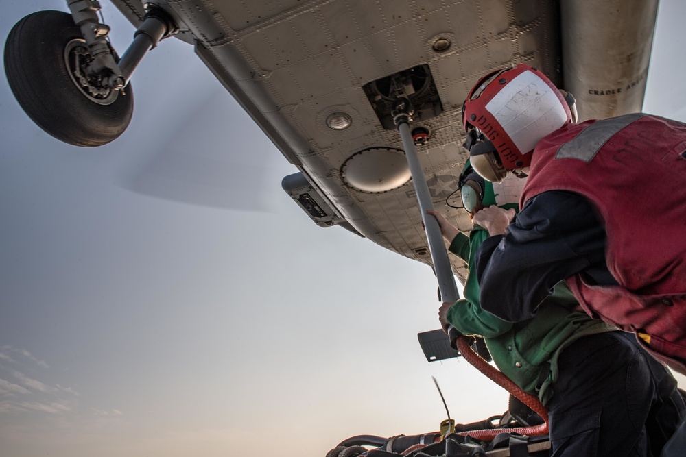 USS Jason Dunham helicopter in-flight refueling and vertical replenishment