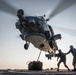 USS Jason Dunham helicopter in-flight refueling and vertical replenishment