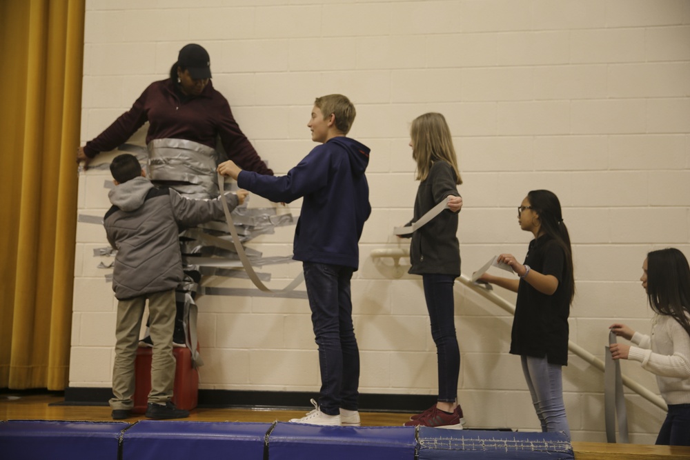 Principal Duct Taped to the Wall