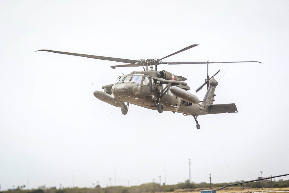 82nd CAB UH-60 Blackhawk Helicopter Proceeds To Land