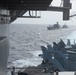 The fleet replenishment oiler USNS Guadalupe (T-AO 200) and the Ticonderoga-class guided-missile cruiser USS Mobile Bay (CG 53) sail behind the Nimitz-class aircraft carrier USS John C. Stennis (CVN 74) after a refueling-at-sea.