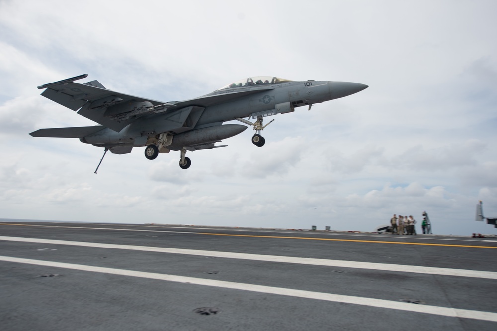 An F/A-18F Super Hornet, with Strike Fighter Squadron (VFA) 41, prepares to land on the flight deck aboard the Nimitz-class aircraft carrier USS John C. Stennis (CVN 74).