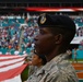 45th SW Airmen unfurl flag at Miami Dolphins game