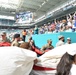 45th SW Airmen unfurl flag at Miami Dolphins game