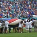 45th SW Airmen unfurl flag at Miami Dolphins game