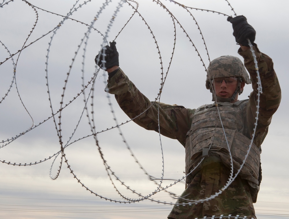 U.S. Army Engineers practice constructing barricades