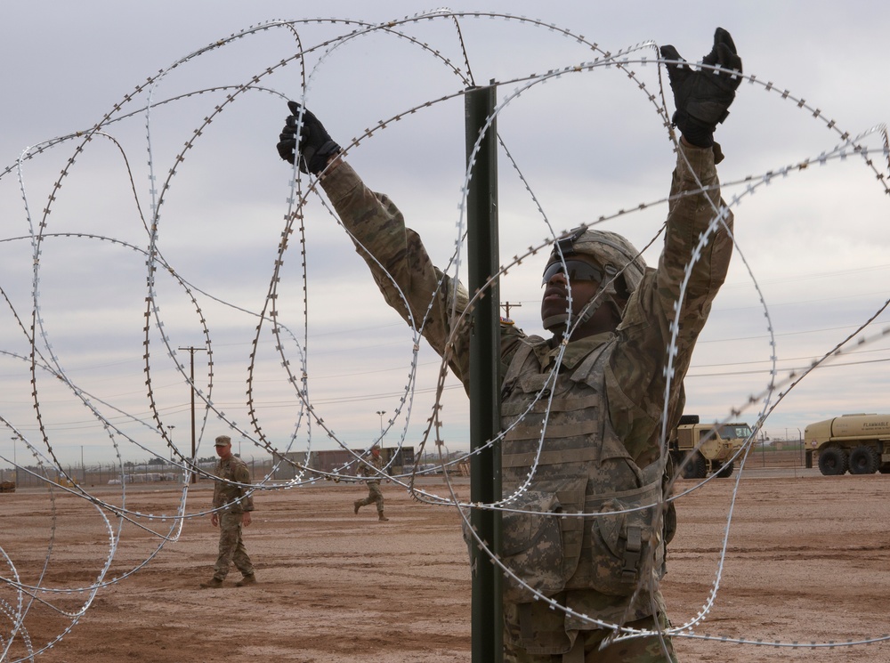 U.S. Army Engineers practice constructing barricades