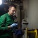 Airman Chevy Foster, from Oroville, California, performs maintenance on an Integrated Catapult Control Station aboard the Nimitz-class aircraft carrier USS John C. Stennis (CVN 74).