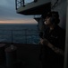 Seaman Apprentice Chrystena Mofield, from Visalia, California, stands the starboard aft lookout watch on the fantail aboard the Nimitz-class aircraft carrier USS John C. Stennis (CVN 74).