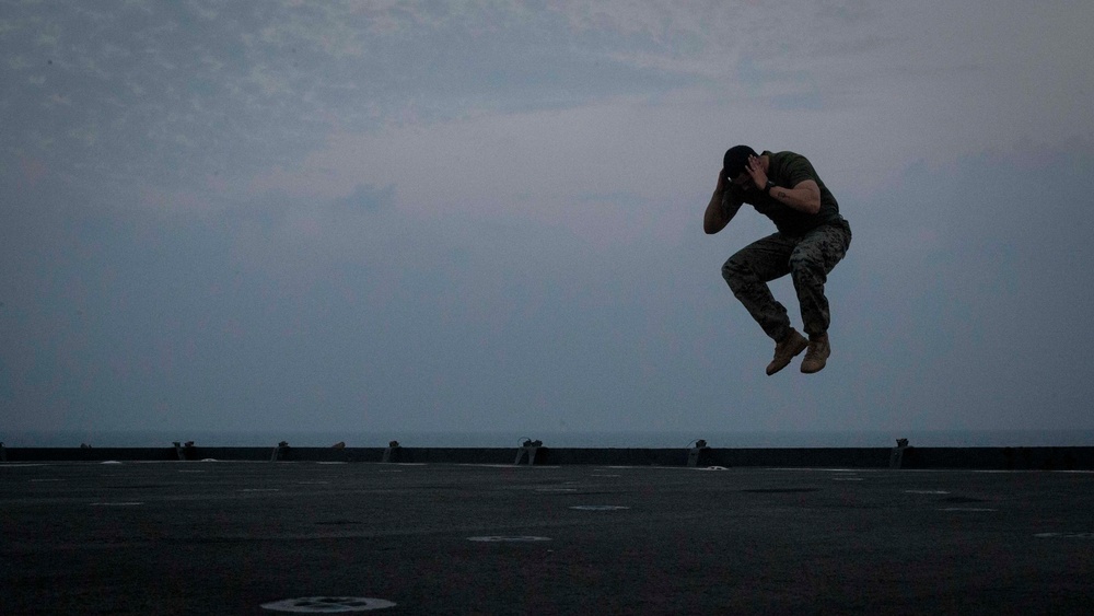 Corporal's Course PTs from the flight deck to the well deck