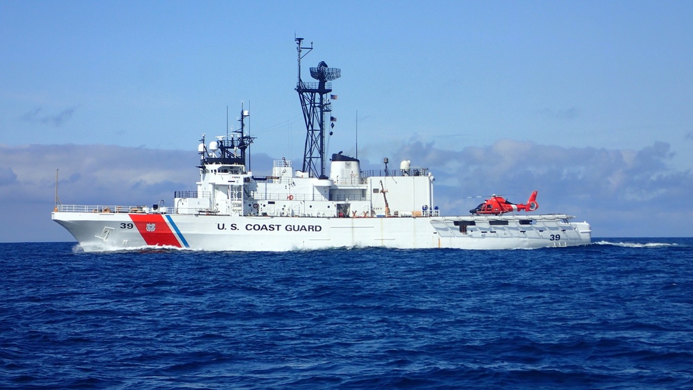 BERING SEA, Alaska - The Coast Guard Cutter Alex Haley is pictured before a Bering Sea patrol with a Coast Guard Air Station Kodiak MH-66 Dolphin helicopter embarked on the stern of the cutter, July 27th, 2018. During Bering Sea patrols the cutter’s crew conducts boarding evolutions of the fishing fleet and can respond to search and rescue cases as needed. U.S. Coast Guard photo.