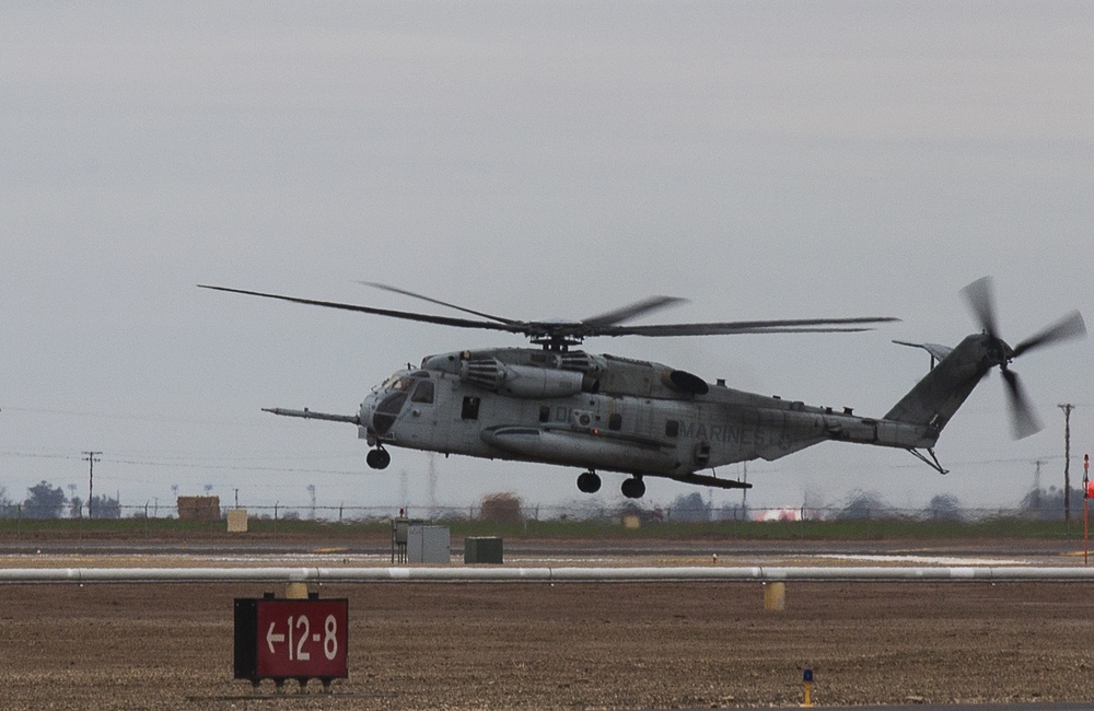 U.S. Marines with 1st Law Enforcement Battalion ride with HMH-466