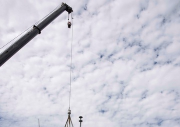 USS Green Bay loads USCG boats