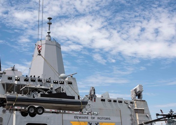 USS Green Bay loads USCG boats
