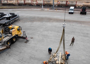 USS Green Bay loads USCG boats