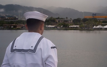 USS Michael Murphy (DDG 112) Sailors pay their respects during the 77th Pearl Harbor Remembrance Day ceremony