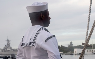 USS Michael Murphy (DDG 112) Sailors pay their respects during the 77th Pearl Harbor Remembrance Day ceremony