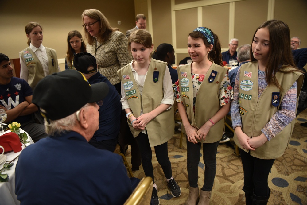 Girl Scouts Greet Honor Flight World War II Veterans