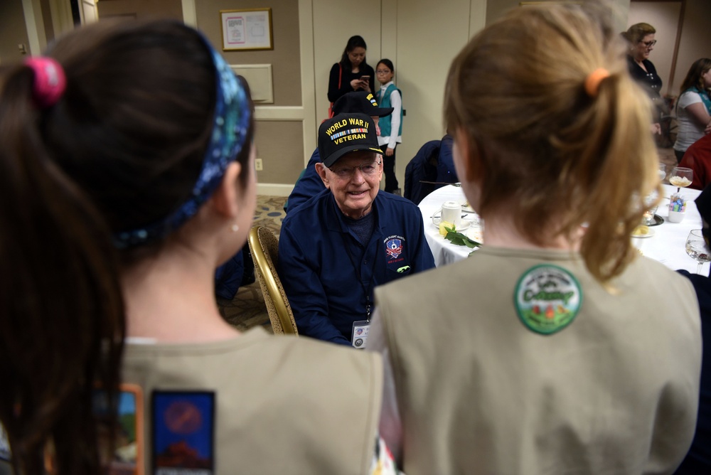 Girl Scouts Greet Honor Flight World War II Veterans