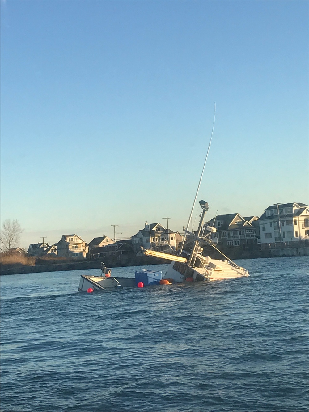Coast Guard monitoring salvage of partially-sunken vessel in Manasquan Inlet, NJ