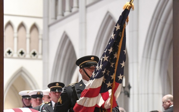 President H.W. Bush's Remains Escorted For Departure