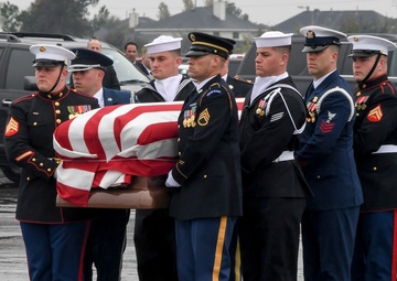 President H.W. Bush's Remains Escorted For Departure