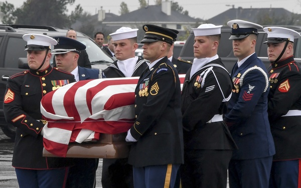 President H.W. Bush's Remains Escorted For Departure