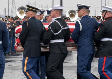 President H.W. Bush's Remains Escorted For Departure