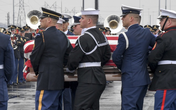 President H.W. Bush's Remains Escorted For Departure
