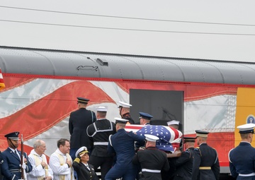 President H.W. Bush's Remains Escorted For Departure