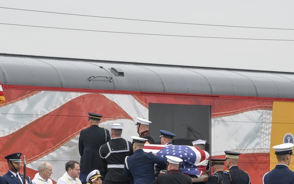 President H.W. Bush's Remains Escorted For Departure