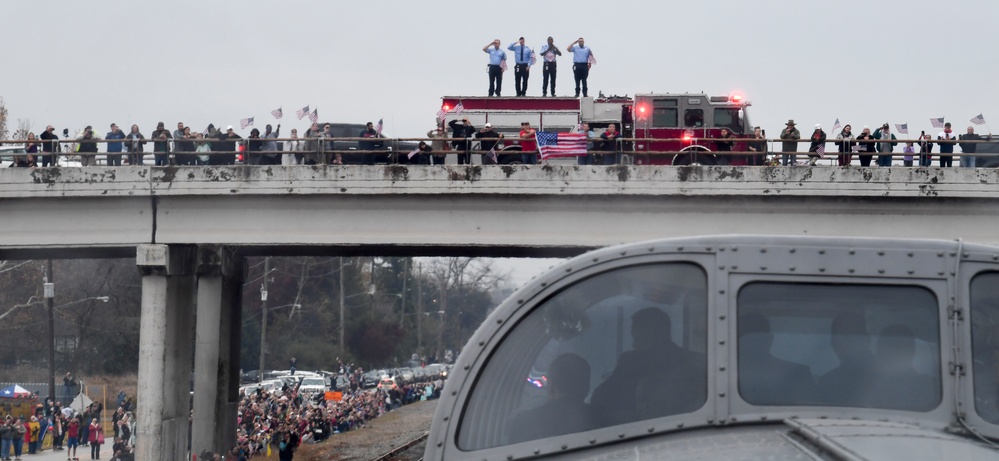 President H.W. Bush's Remains Escorted For Departure