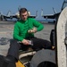 U.S. Navy Sailor conducts maintenance on the flight deck