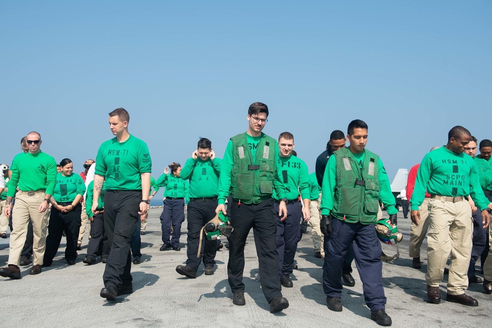 U.S. Sailors conduct foreign-object and debris walk down