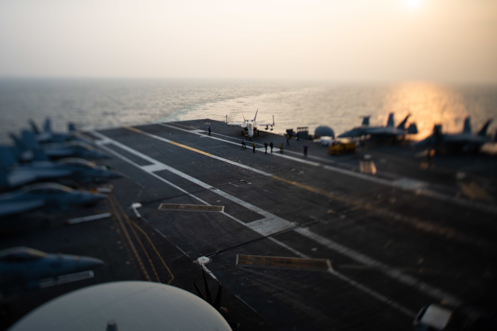 An F/A-18E Super Hornet, with Strike Fighter Squadron (VFA) 14, is taxied into position on the flight deck aboard the Nimitz-class aircraft carrier USS John C. Stennis (CVN 74).